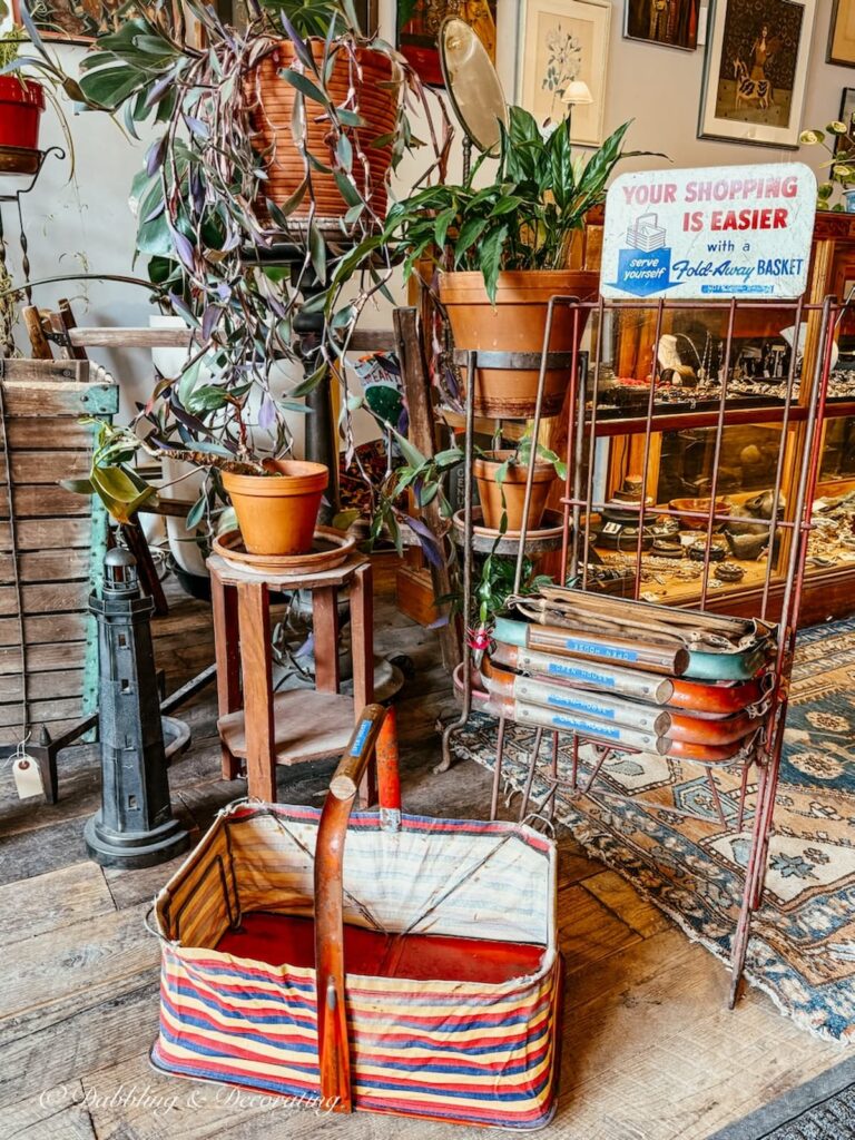 A rack of antique folding shopping baskets at the Open House vintage store in downtown Portland, Maine.