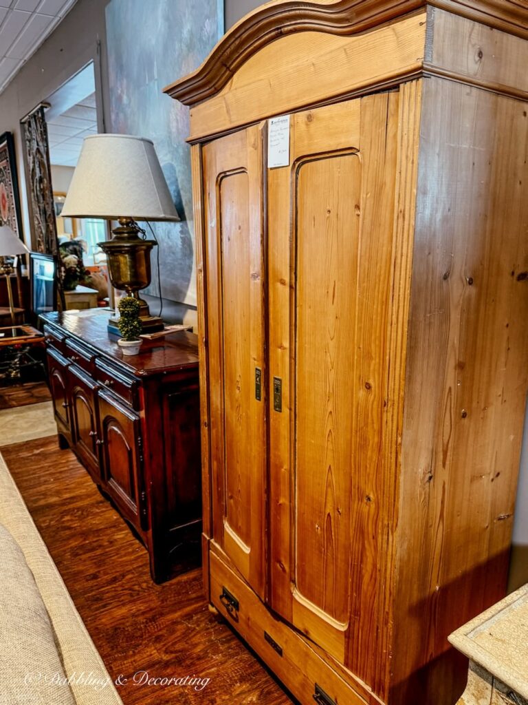 Vintage pine hutch in antique store while looking for a cabinet for a Scullery-Inspired Kitchen Workroom in an open floor plan.
