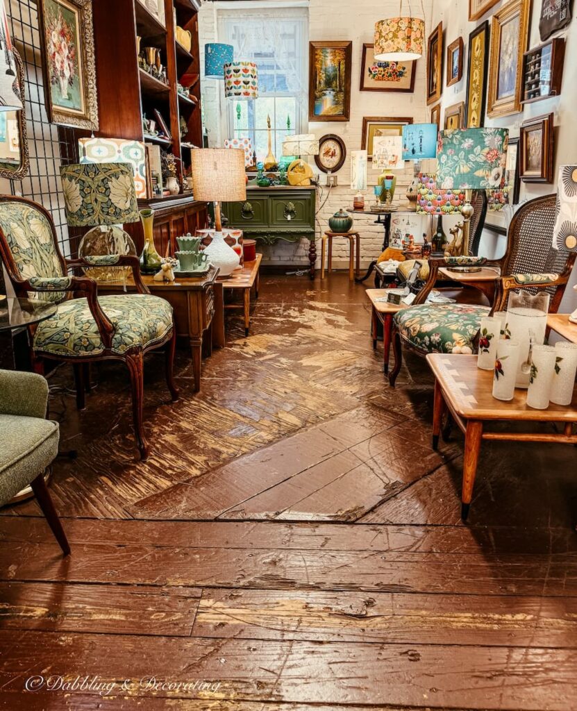Mid Century Modern antique booth with handmade lampshades inside Seneca Cannery antiquing in Maryland.