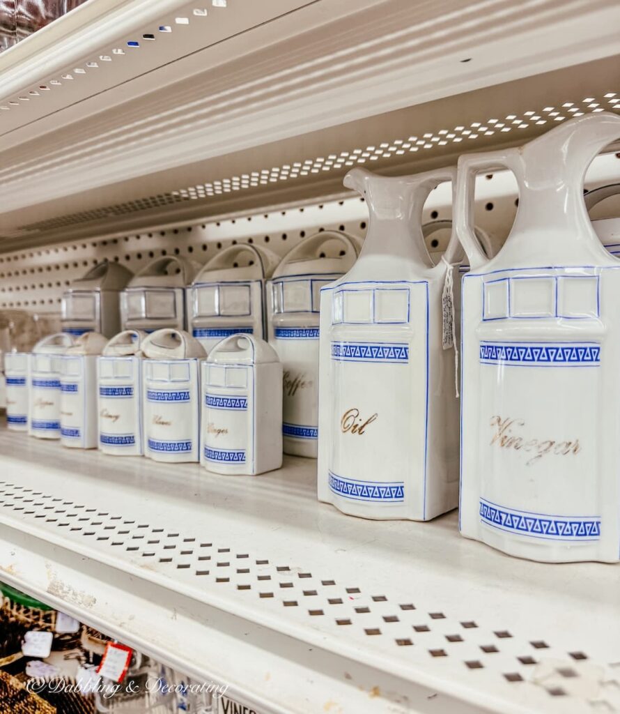 Vintage ceramic white and blue canister set antiquing in Maryland.