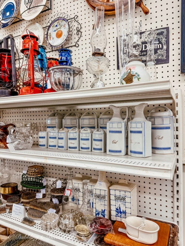 Vintage German canister set on shelf antiquing in Maryland.