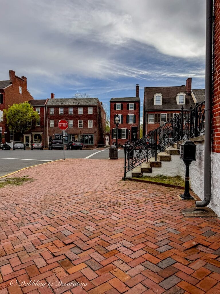 Downtown New Castle Delaware with brick cobblestone streets and buildings. Quint place to shop for antiques.