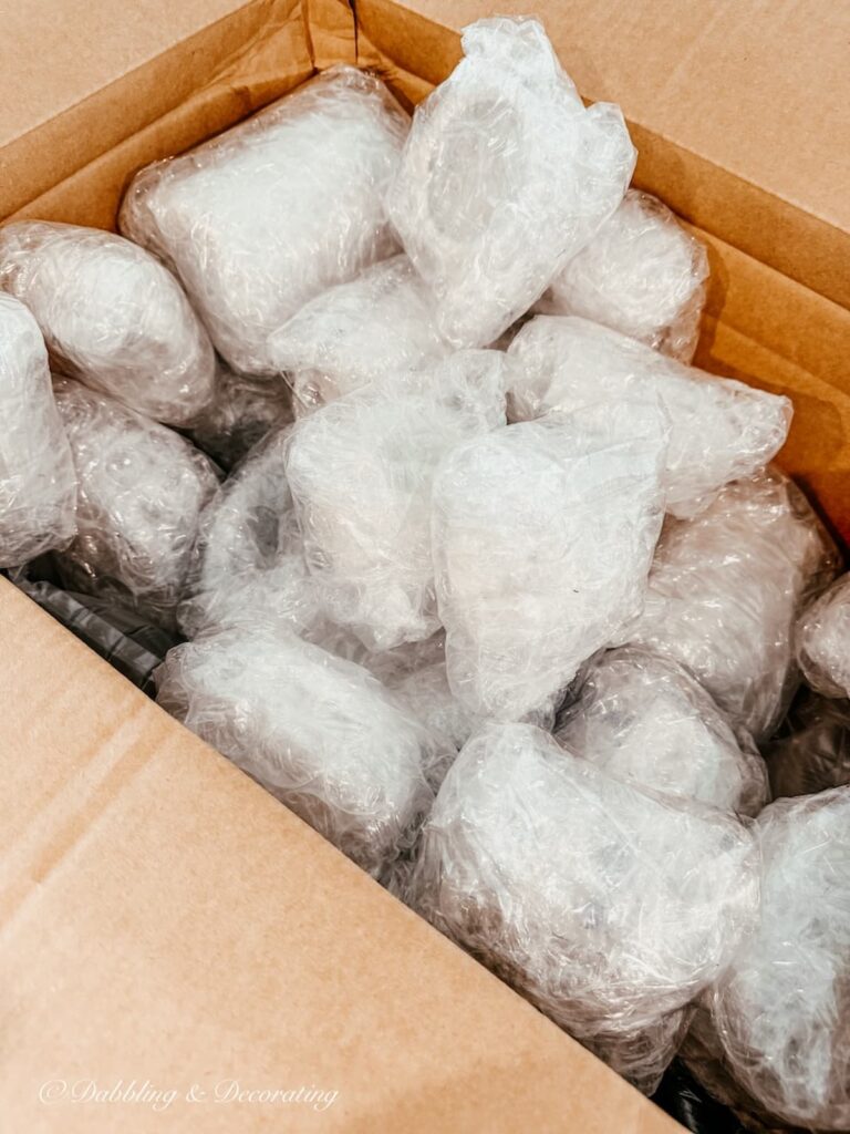 Bubble wrapped vintage finds in box.