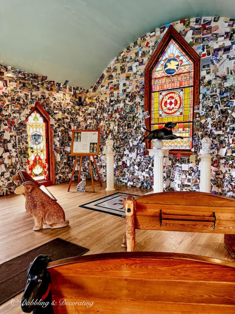 Inside the chapel at Dog Mountain in St. Johnsbury, Vermont with all the pictures and letters pasted all over the walls.