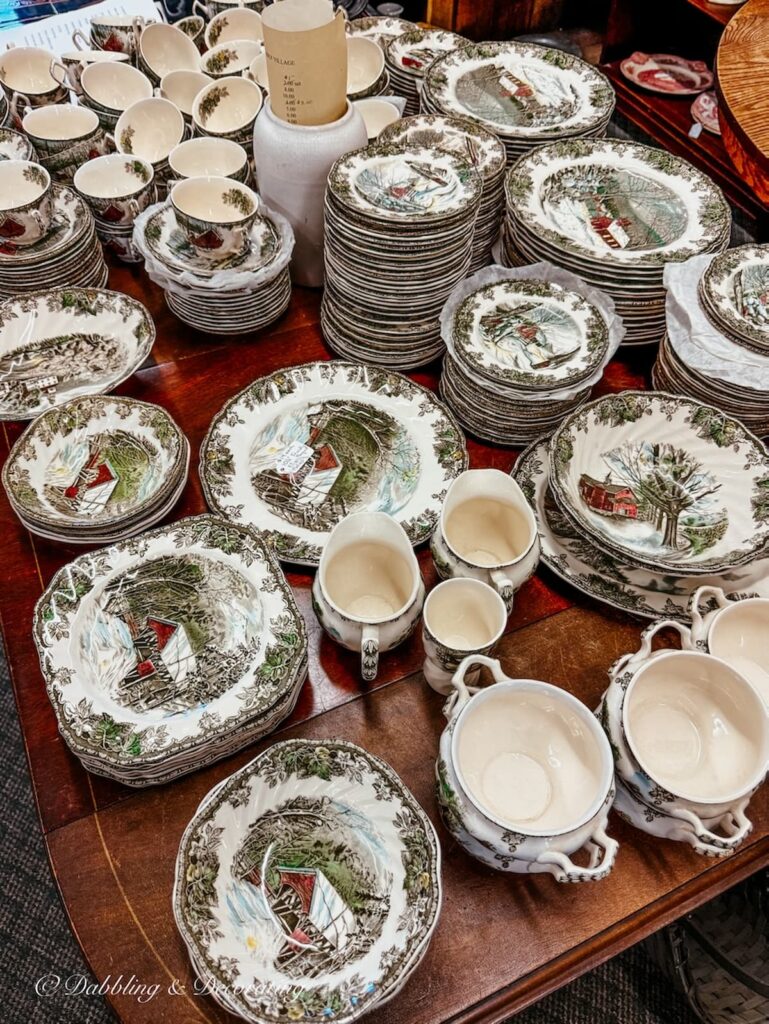 A large set of The Friendly village dishware sets by Johnson Brothers in an antique store in New England.