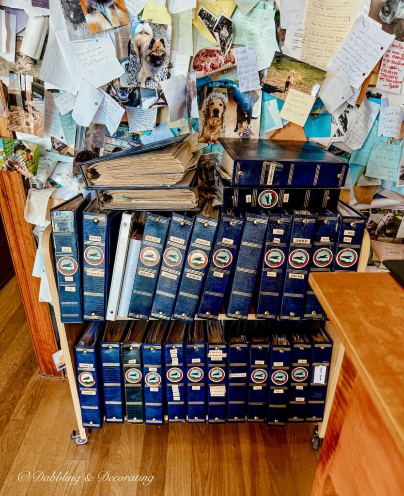 Blue binders on wheeling cart inside the chapel at Dog Mountain.