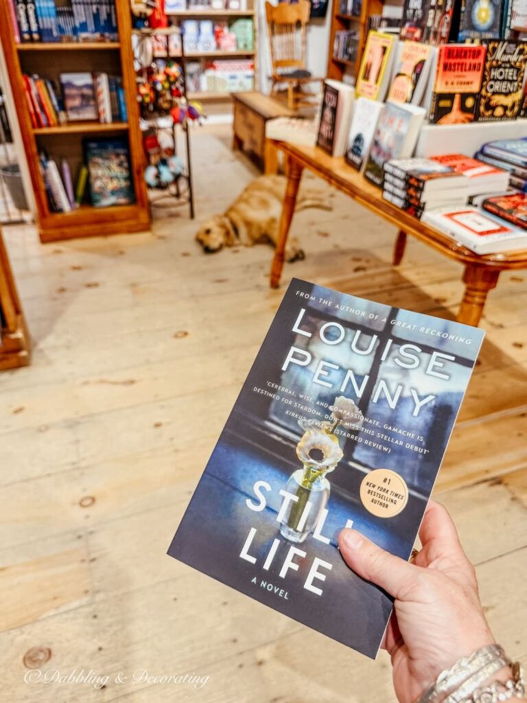 Louise Penny's First Mystery Book in Hand Still Life in bookstore in Knowlton, Quebec.