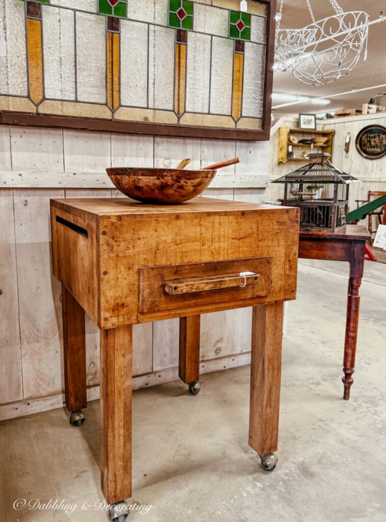 Vintage wooden butcher block table in antique store in Vermont.