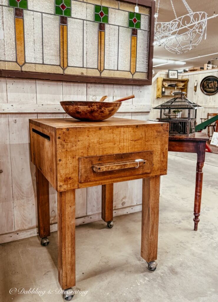 Vintage wooden butcher block table in antique store in Vermont.