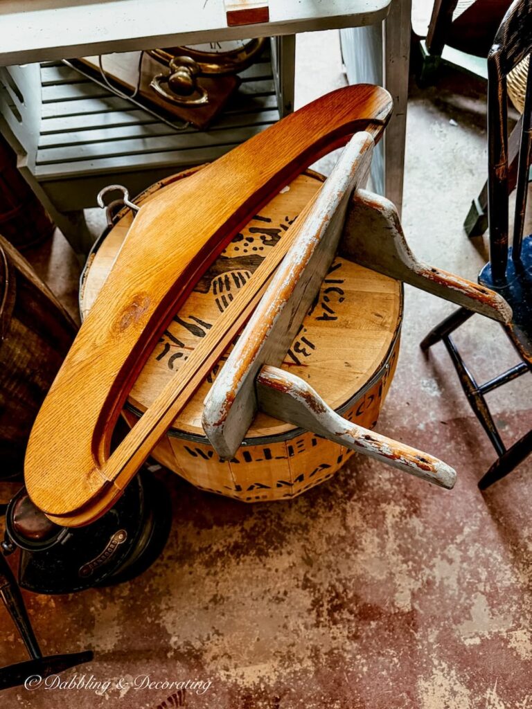 Two oversized vintage wooden clothes hangers in antique store in Sutton, Quebec.