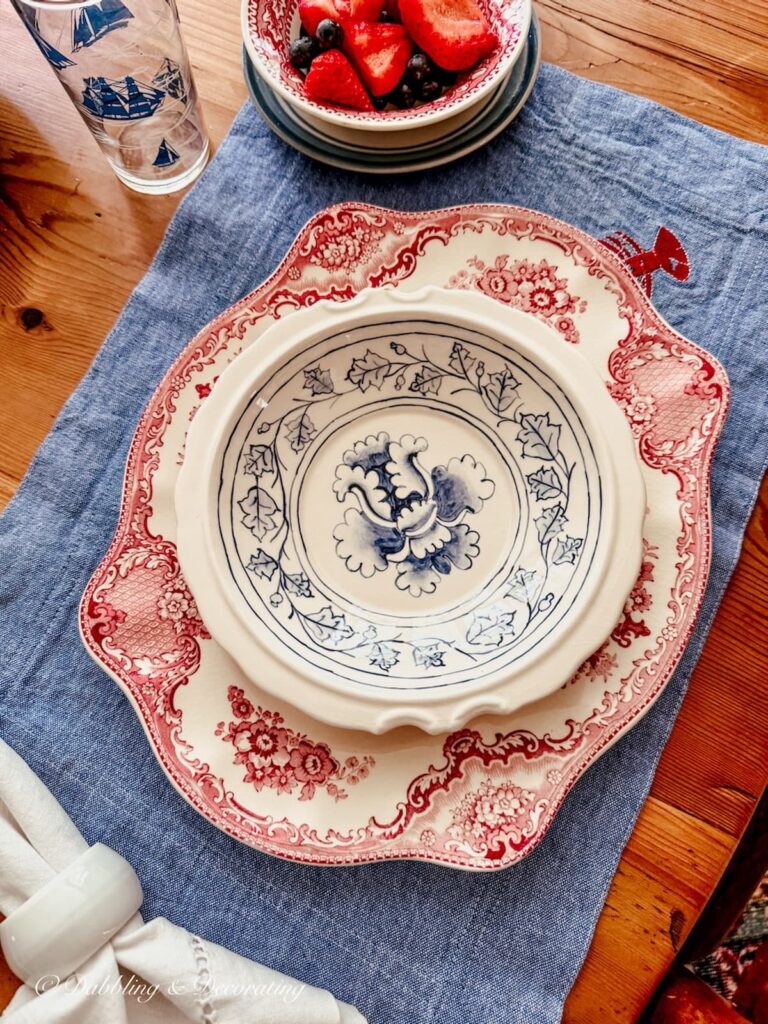 vintage red, white, and blue dishes for Patriotic place setting ideas.