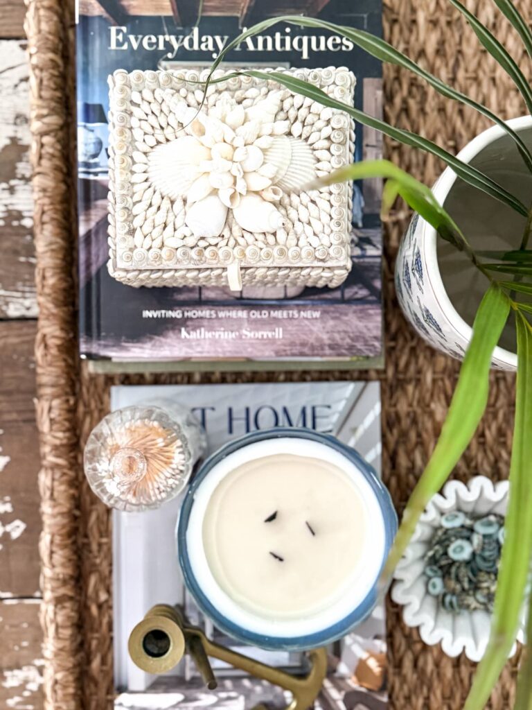 Coastal Grandmother vintage decorating ideas on coffee table.