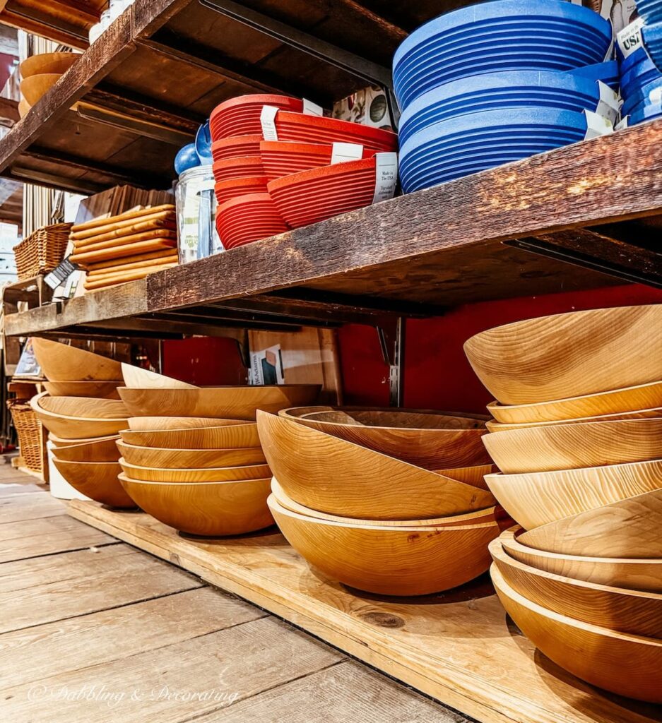 Handmade wood bowl collection on the bottom shelf at The Vermont Country Store.