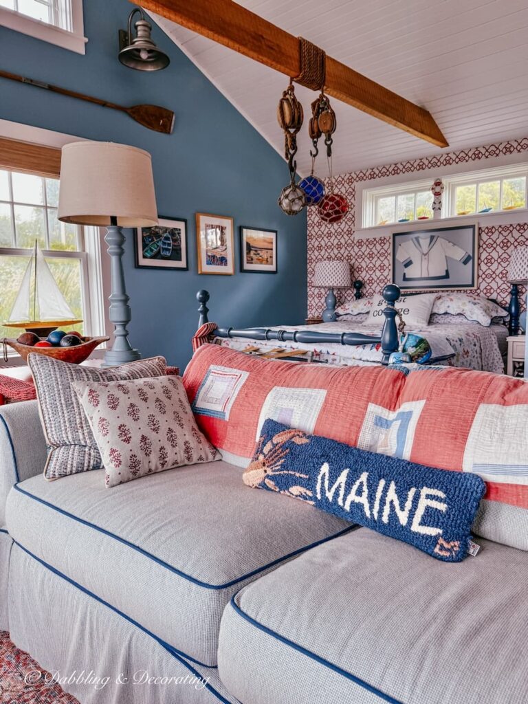 Coastal Maine guest cottage full of color in shades of blues and salmon.