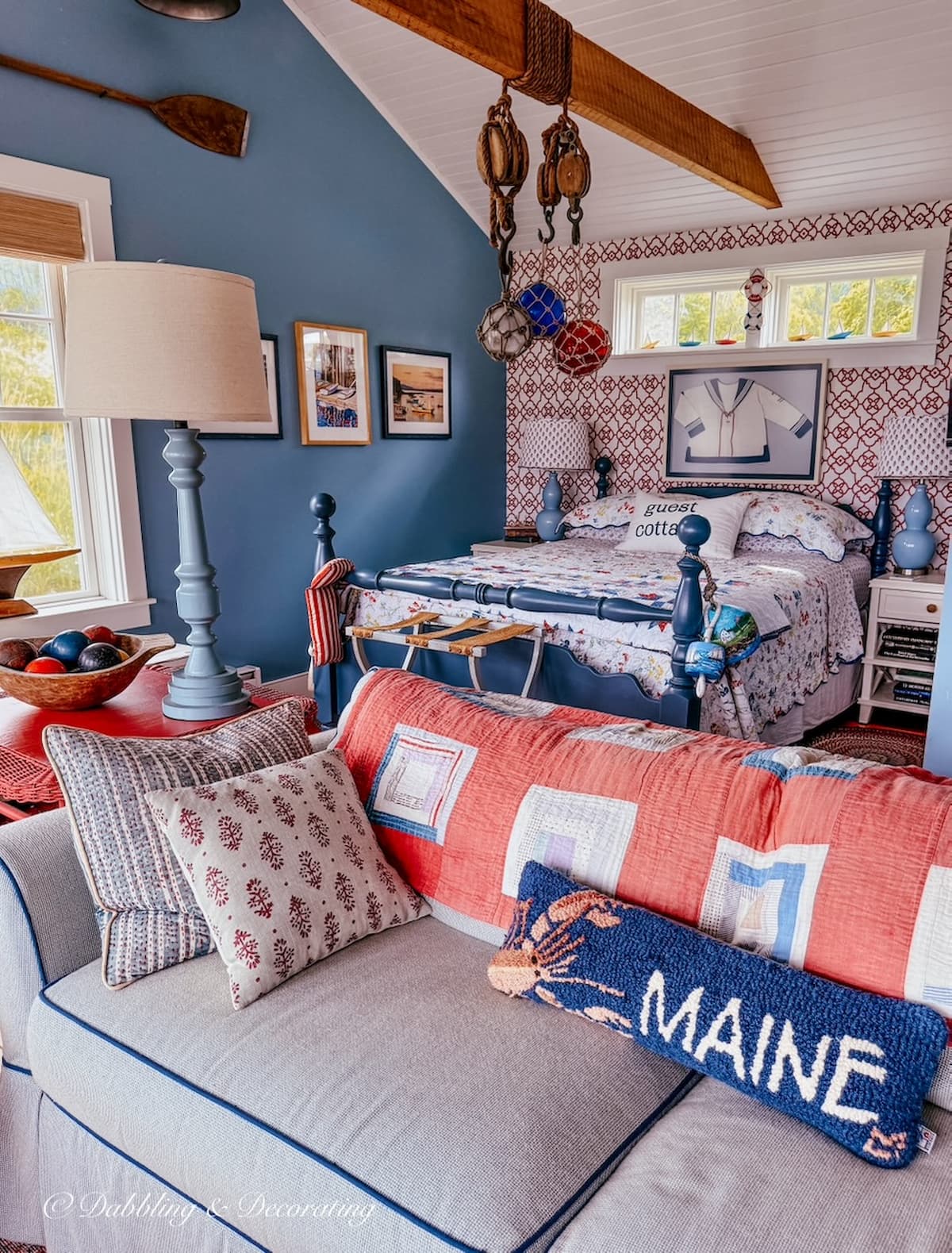 Inside a colorful coastal Maine guest cottage styled with beautiful antiques and vintage collections.