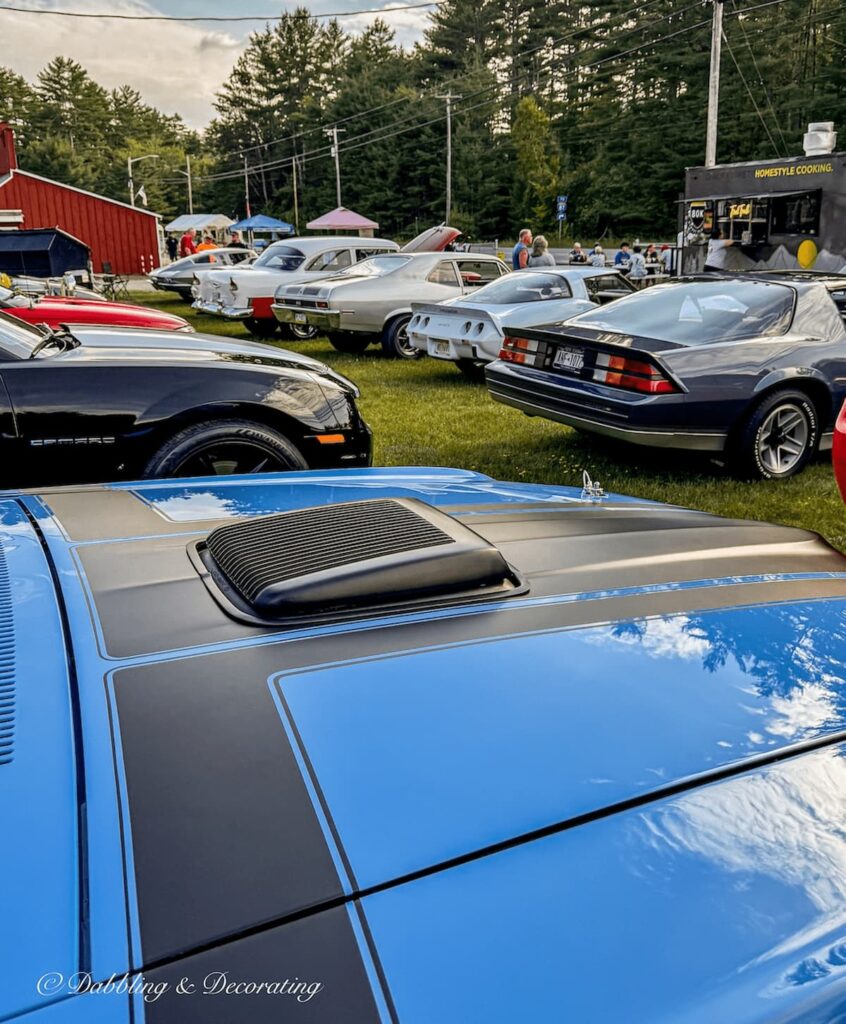 A collection of vintage and antique cars during Hay Field's Antique store's Music, Munchies, and Motors Mondays.