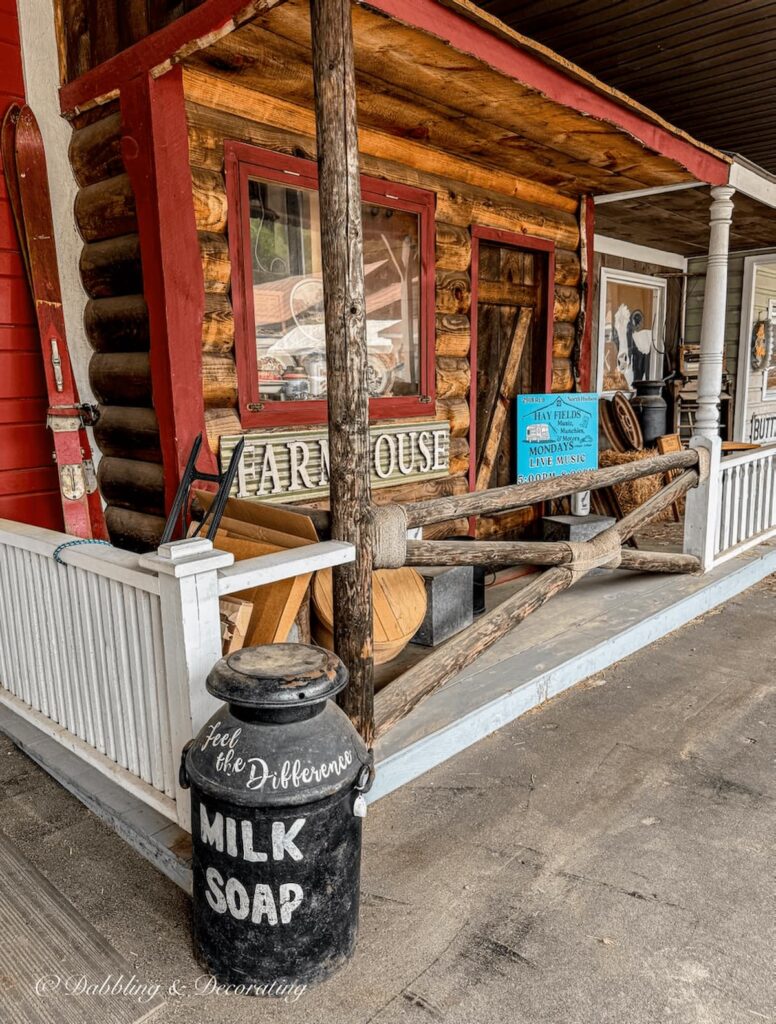 Farmhouse display building in log cabin at the Hay Field Antiques Store in the Adirondacks.