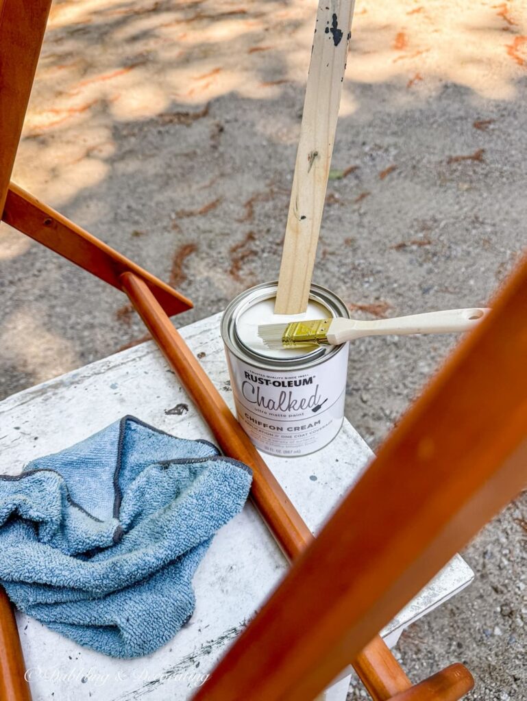 Chiffon Cream chalk paint with a folding luggage rack waiting to be painted.