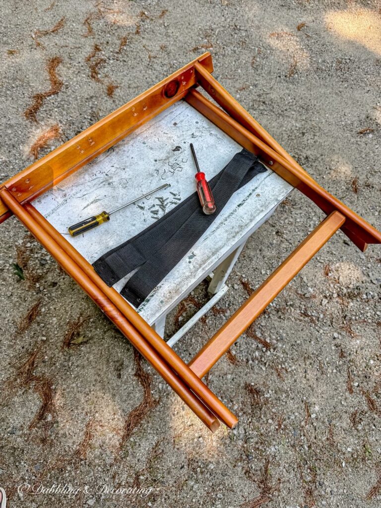 Wooden Folded luggage rack with the webbing removed for a paint makeover.