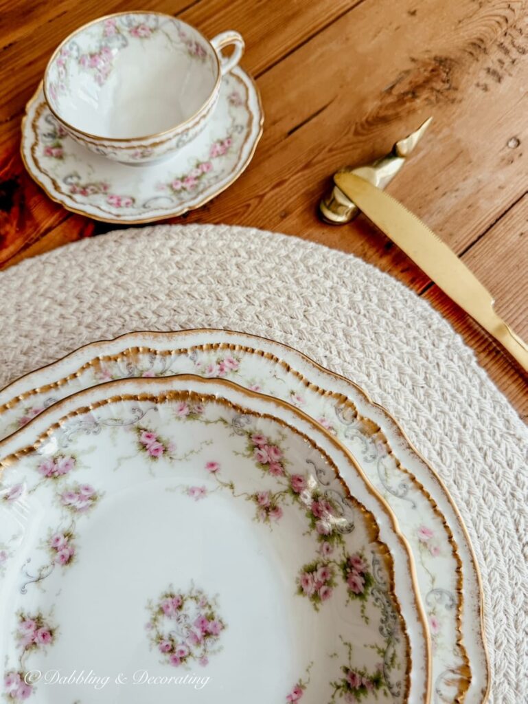 A place setting of Theadore Haviland Limoges family heirloom china on table setting