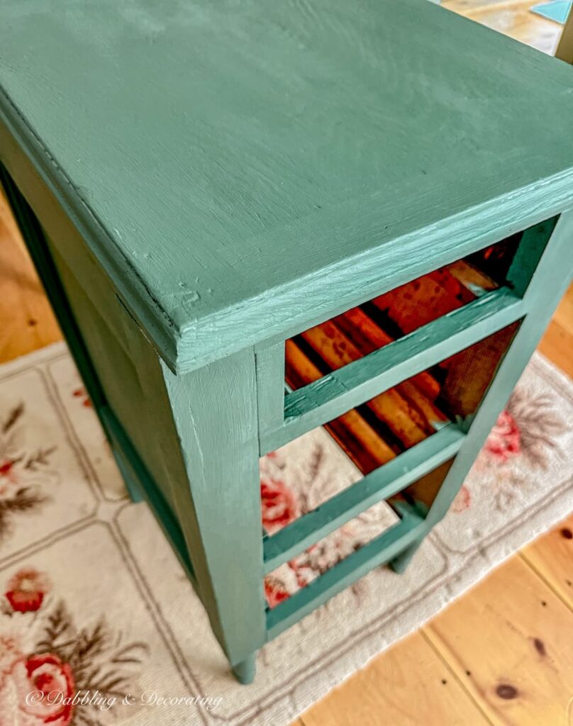 Annie Sloane's Amsterdam Green with Country Grey on a painted nightstand.