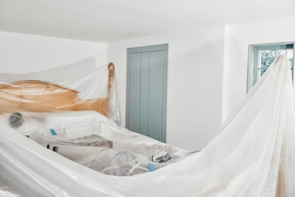 Picture taken by the painter during this custom blue historic paint color being applied with Simply White Walls in 2020.