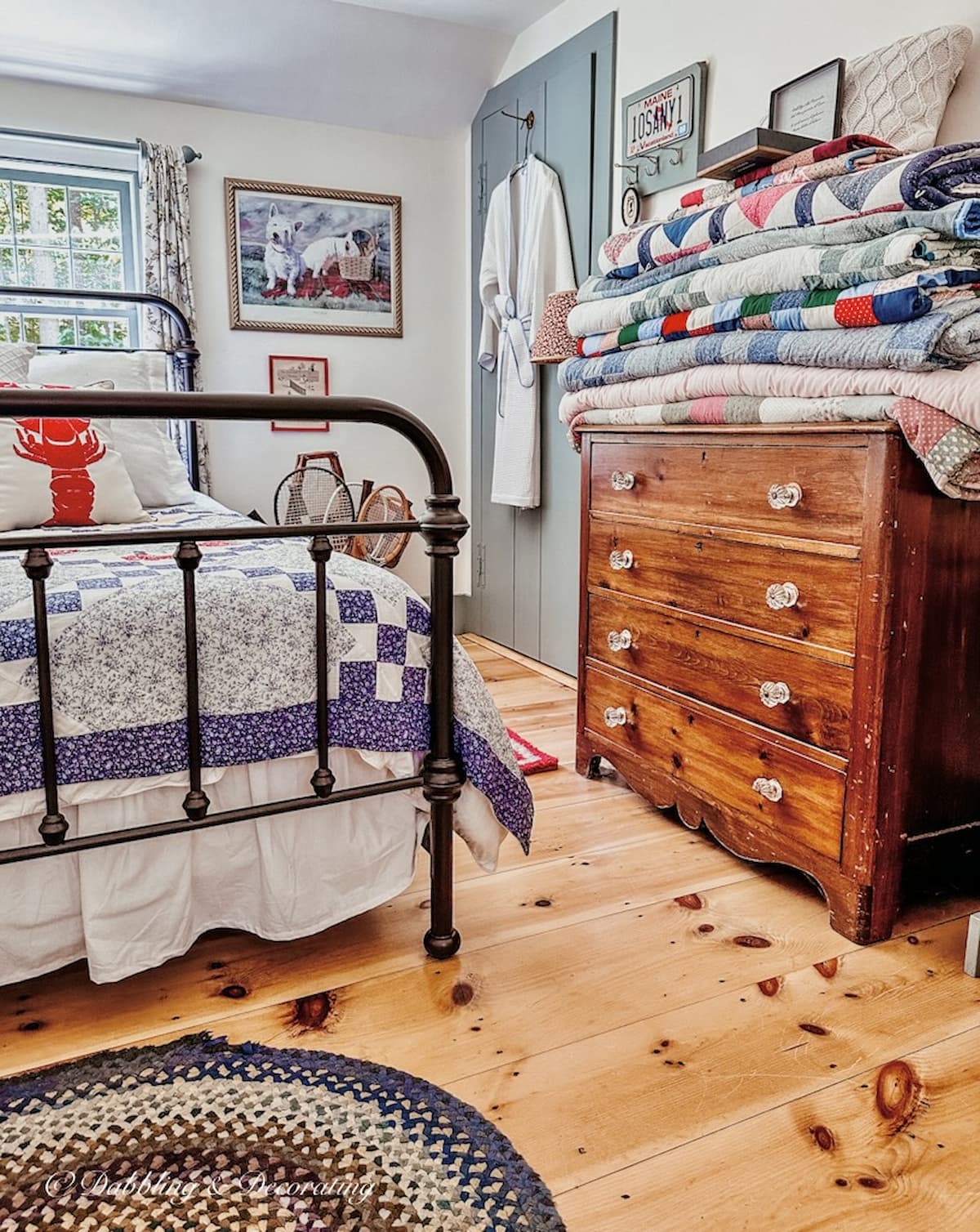 Small guest bedroom in Coastal Maine home with vintage style and a historic blue-gray paint color on the trim and Simply white paint on the walls.