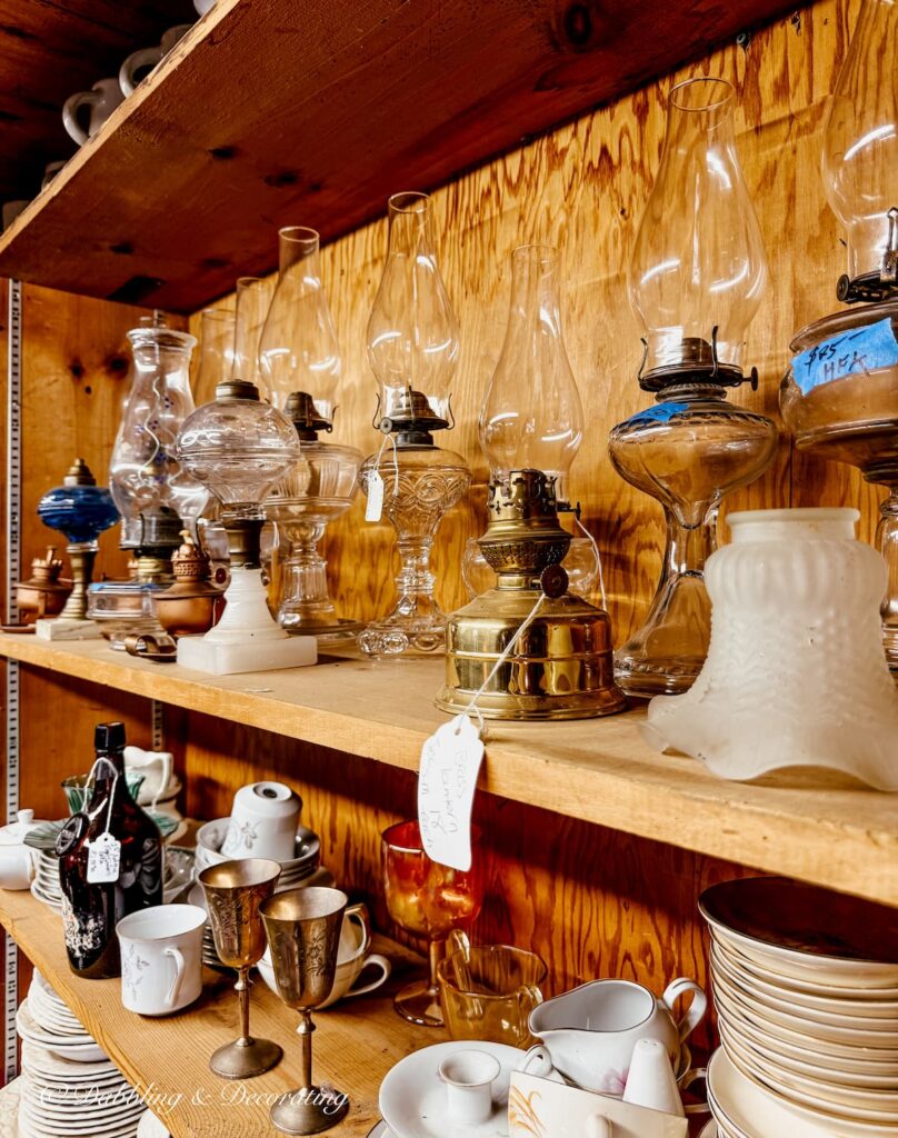 Antique oil collection in antique store; The Vintage Den in Vermont.