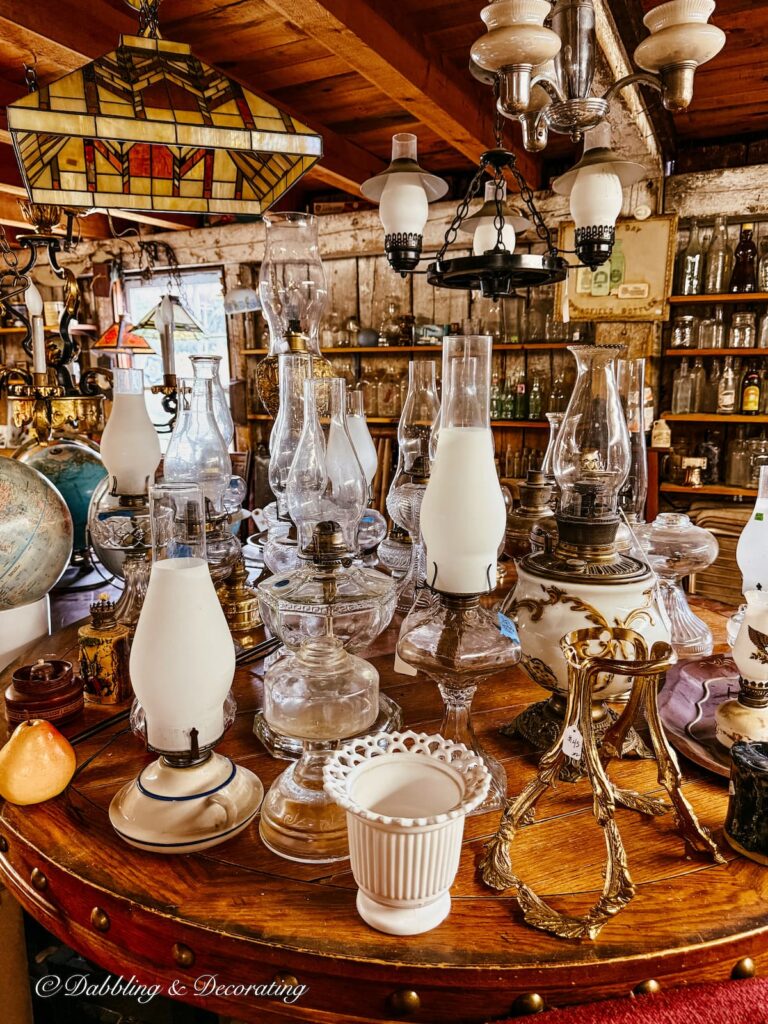 Antique oil collection in antique store; The Vintage Den in Vermont.