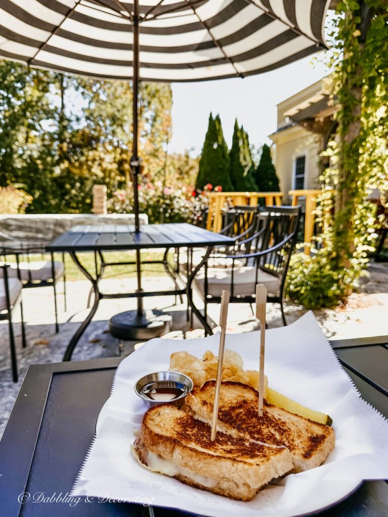 Grilled cheese sandwich on outdoor table at J.J. Hapgood Store in Peru, Vermont after an afternoon hike around Hapgood Pond in Vermont.