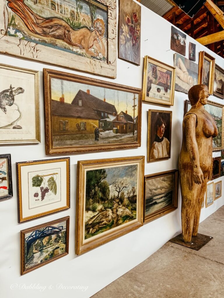 Antique wall art inside High-End Antique Boothsat Taconic Antiques Fair in Chatham, New York.