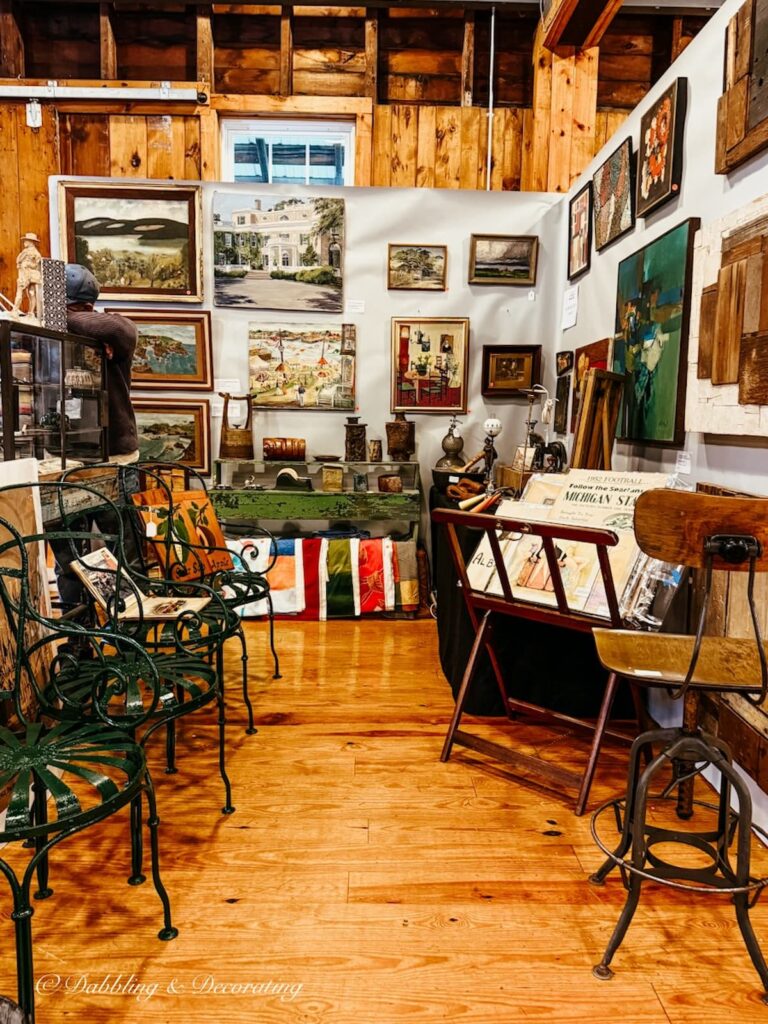 Antique wall art inside High-End Antique Booths at Taconic Antiques Fair in Chatham, New York.