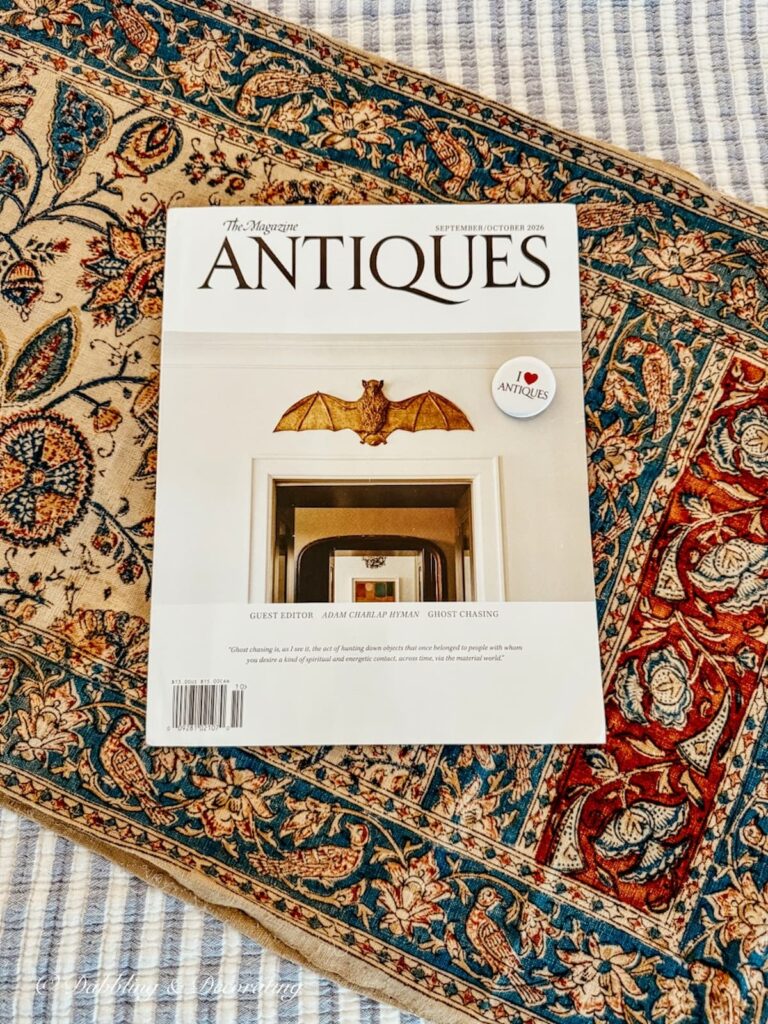 Iranian antique textile with Antiques magazine and I love antiques pin.