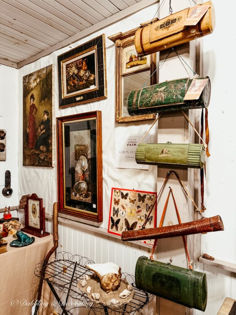 Antique wall art inside High-End Antique Booths at Taconic Antiques Fair in Chatham, New York.